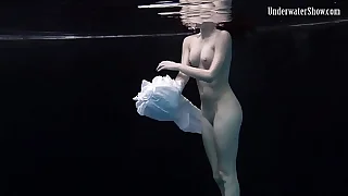 Redhead beauty in the white dress